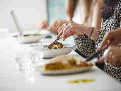 Eu Women Eating Lunch Plates In Focus