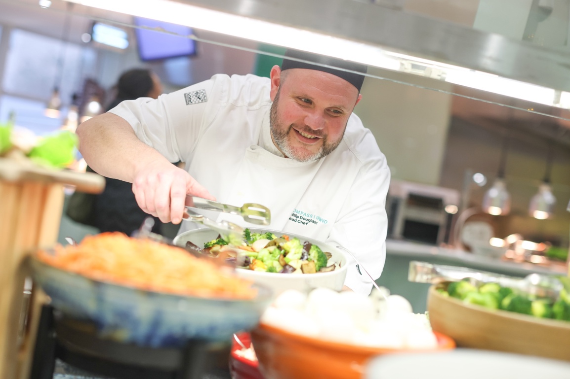 Ire Citibank Phil Chef Smiling Salad Counter Action